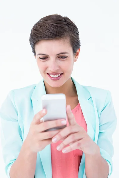 Beautiful woman using her smartphone Stock Photo