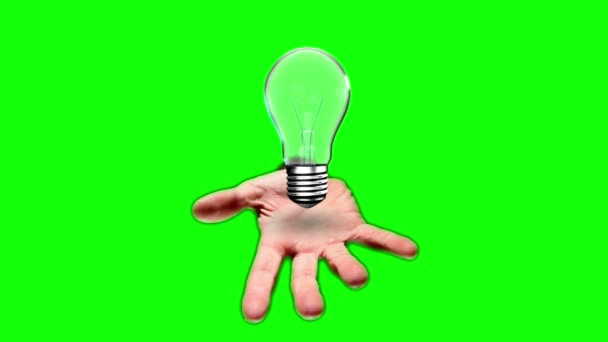 Hand presenting light bulb — Stock Video