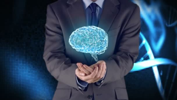 Empresario presentando cerebro con manos — Vídeo de stock