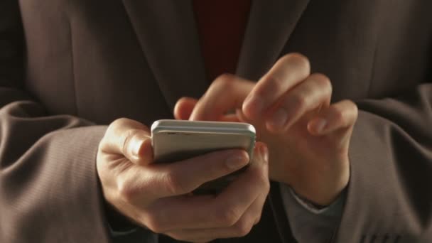 Businessman using his smartphone — Stock Video