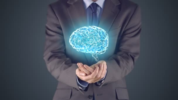 Businessman presenting brain with hands — Stock Video