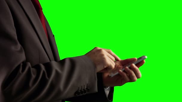 Businessman using his smartphone — Stock Video