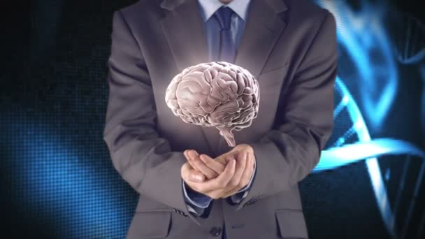 Empresario presentando cerebro con manos — Vídeos de Stock