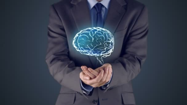 Businessman presenting brain with hands — Stock Video