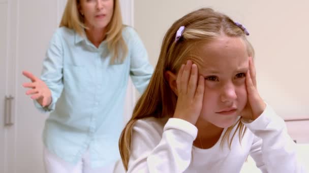 Upset little girl covering her ears — Stock Video
