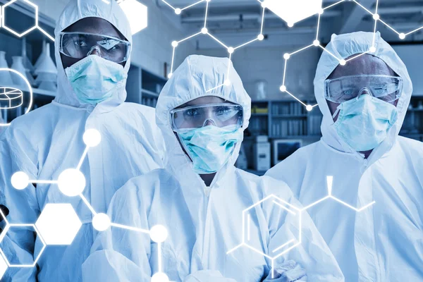 Team of three chemists — Stock Photo, Image