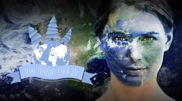 Earth day graphic against earth overlay on face — 图库照片