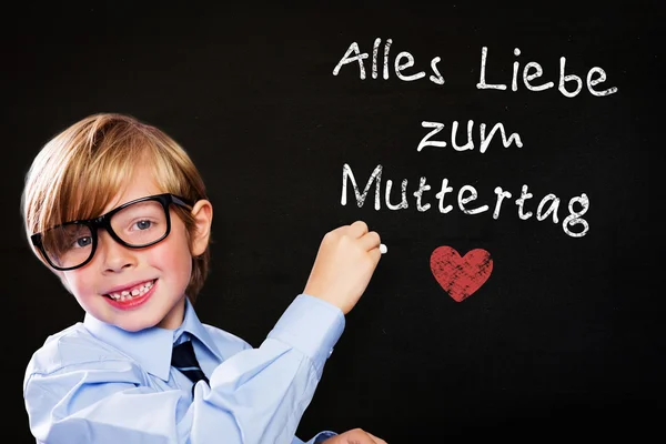 Composite image of cute pupil writing — Stock Photo, Image