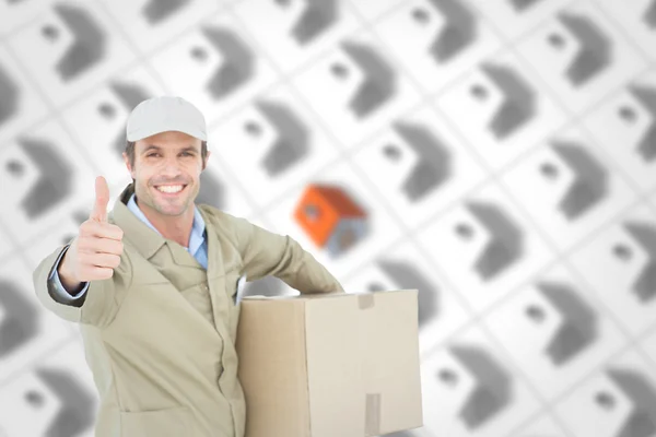 Delivery man gesturing thumbs up — Stock Photo, Image