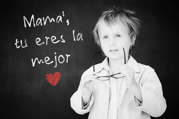 Composite image of schoolchild with blackboard — Stock Photo, Image