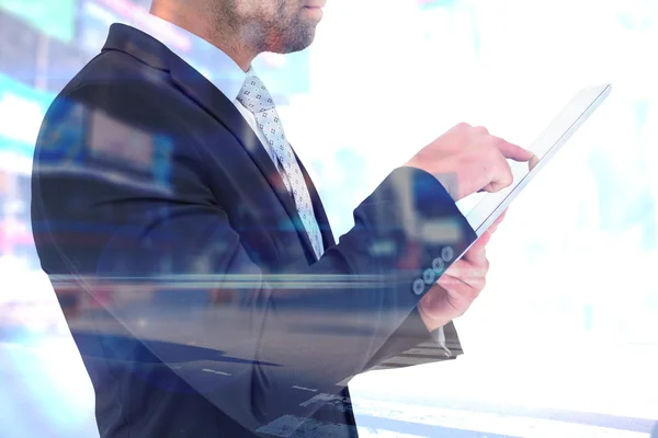 Businessman using his tablet pc — Stock Photo, Image