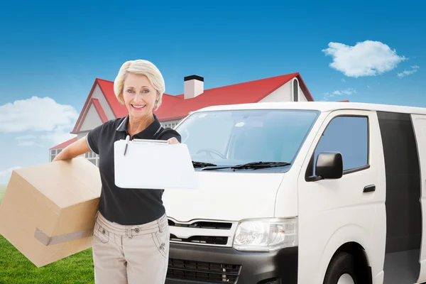 Happy delivery woman looking for signature — Stock Photo, Image