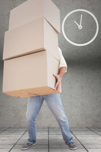 Man carrying pile of boxes — Stock Photo, Image