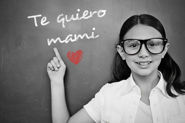 Composite image of schoolchild with blackboard — Stock Photo, Image