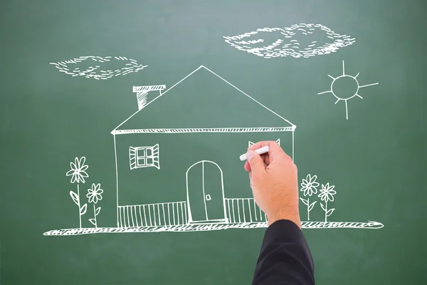 Composite image of hand writing with chalk — Stock Photo, Image