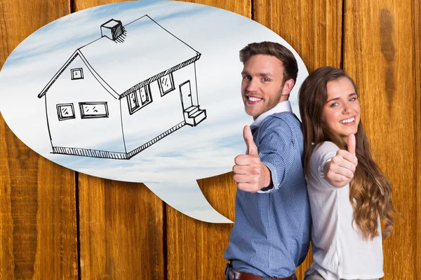 Happy young couple gesturing thumbs up — Stock Photo, Image