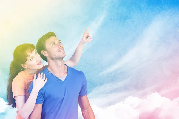 Happy couple looking upwards — Stock Photo, Image