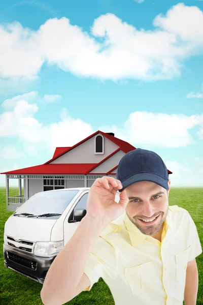 Handsome delivery man wearing baseball cap — Stock Photo, Image