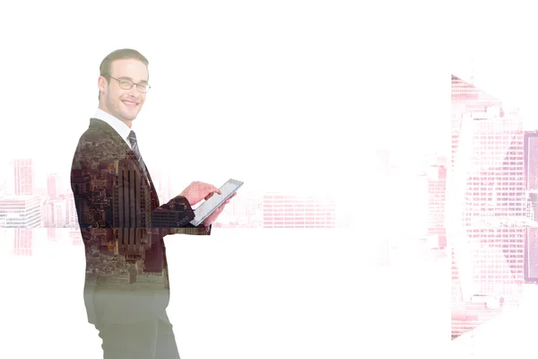 Happy businessman using his tablet pc — Stock Photo, Image