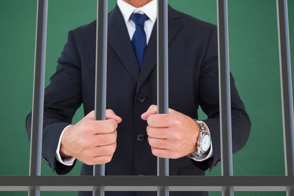 Image composite d'un homme d'affaires en prison — Photo