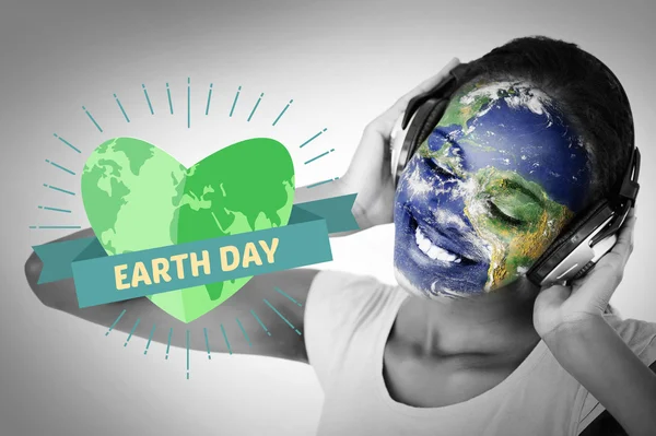 Dia da Terra Gráfico contra a sobreposição da terra no rosto — Fotografia de Stock