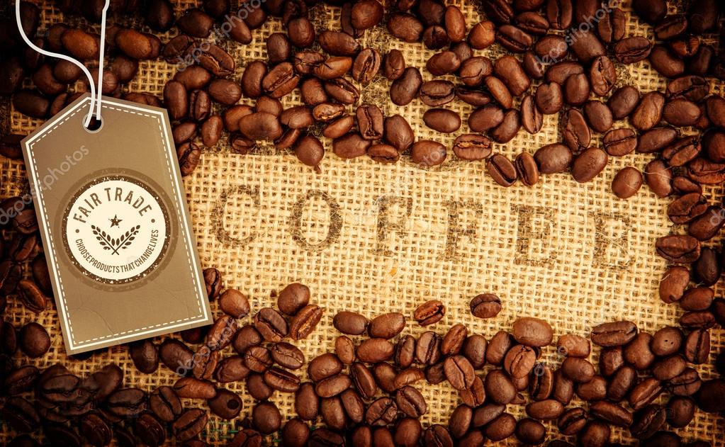 Fair Trade graphic against coffee beans surrounding coffee stamp on sack