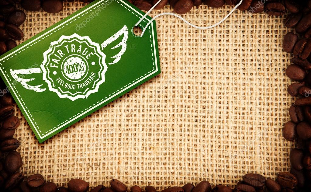 Fair Trade graphic against frame of coffee beans