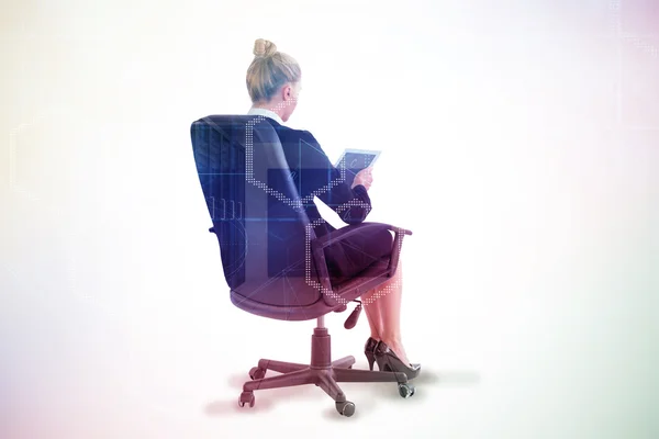 Businesswoman sitting on swivel chair — Stock Photo, Image