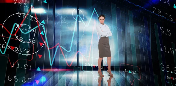 Composite image of businesswoman with arms crossed — ストック写真