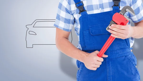Repairman holding adjustable pliers — Stock Photo, Image