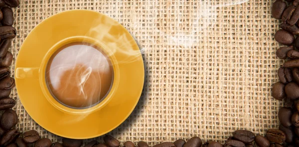 Imagem composta de xícara de café amarelo — Fotografia de Stock