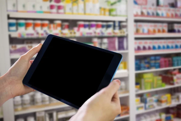 Imagem composta de mãos segurando tablet — Fotografia de Stock