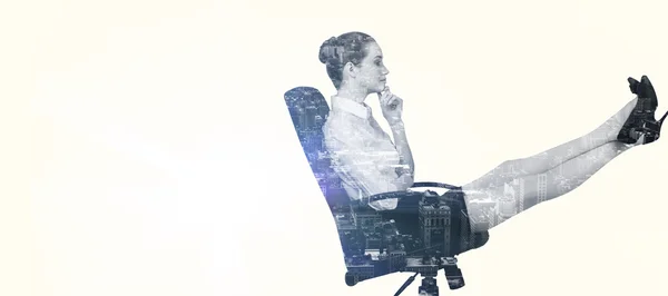 Composite image of businesswoman sitting on swivel chair with fe — 图库照片