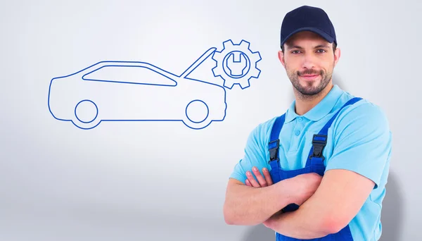 Handyman in coveralls standing arms crossed — Stock Photo, Image