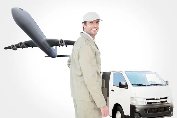 Side view portrait of happy delivery man — Stok fotoğraf