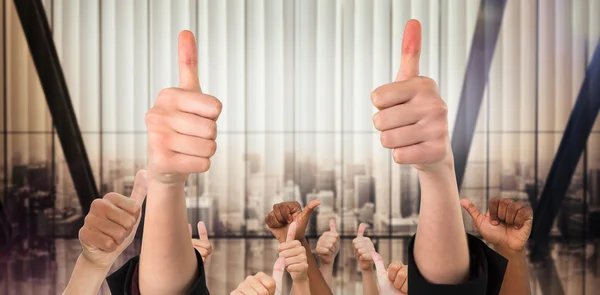 Imagem composta de mãos mostrando polegares para cima — Fotografia de Stock