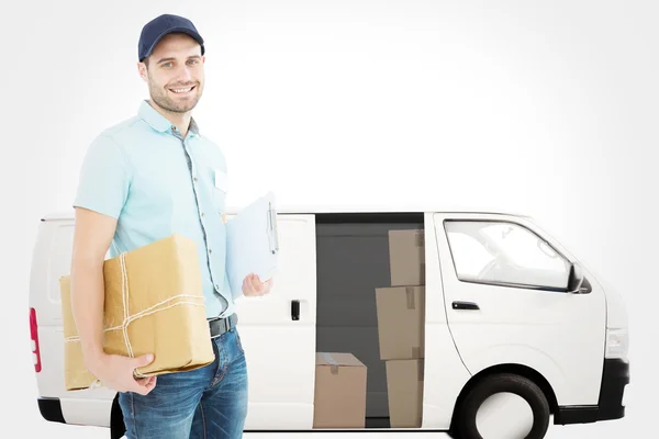 Portrait of happy courier man with parcel — Stok fotoğraf