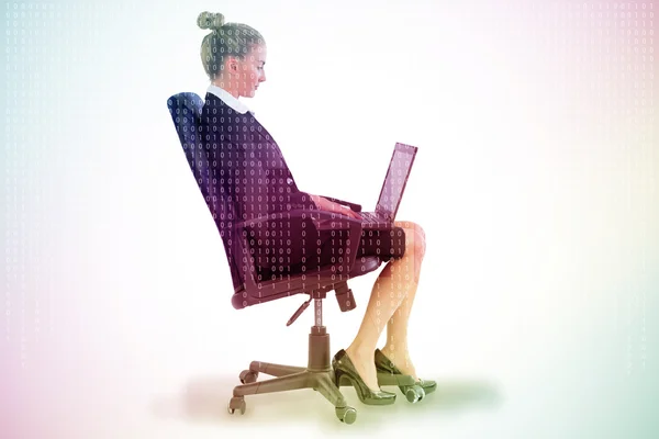 Businesswoman sitting on swivel chair — Stock Photo, Image