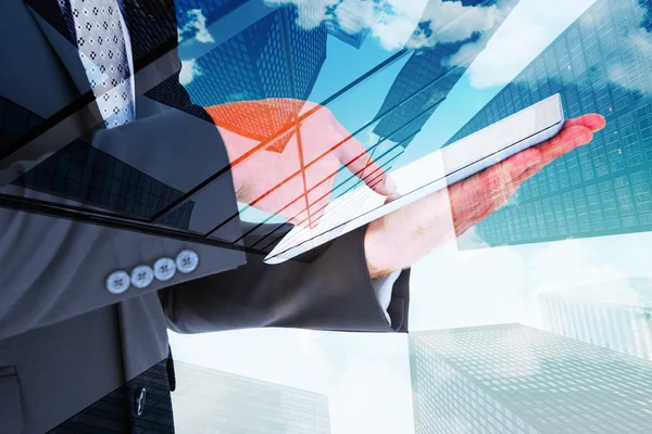 Businessman using his tablet pc — Stock Photo, Image