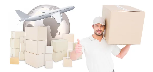 Composite image of delivery man with cardboard box gesturing thu — Stock fotografie