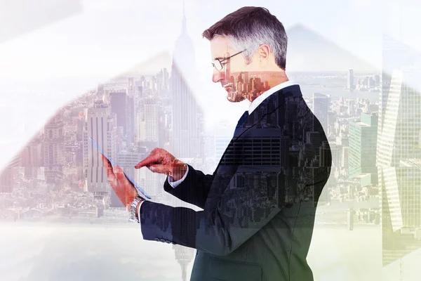 Mid section of a businessman touching tablet — Stock Photo, Image