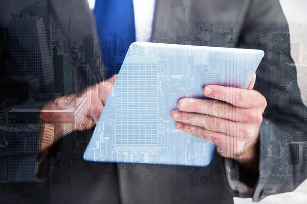 Businessman scrolling on his digital tablet — Stock Photo, Image