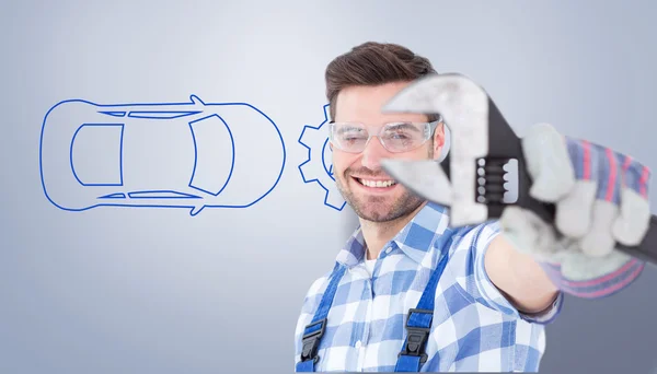 Handyman wearing protective glasses — Stock Photo, Image