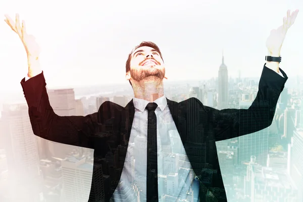 Businessman cheering with hands raised — Stock Photo, Image