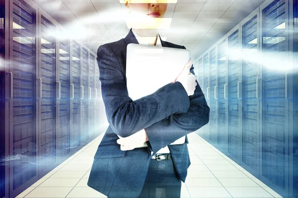 Composite image of businesswoman holding laptop — Stock Photo, Image