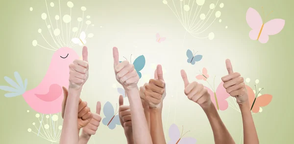 Composite image of thumbs raised and hands up — Stock Photo, Image