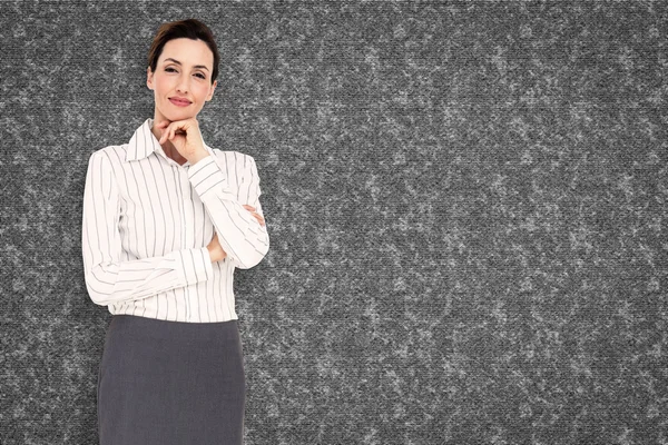 Composite image of smiling businesswoman — Stock Photo, Image