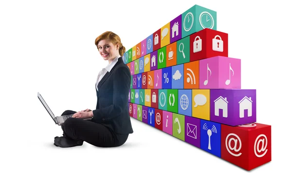 Redhead businesswoman using laptop — Stock Photo, Image