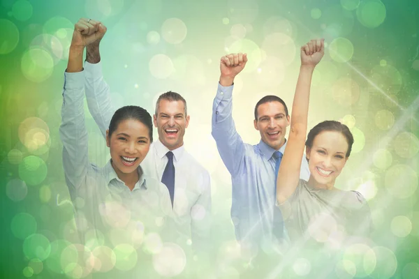 Cheerful work team posing with hands up — Stock Photo, Image