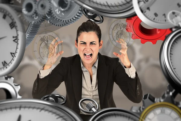 Composite image of angry businesswoman gesturing — Stock Photo, Image